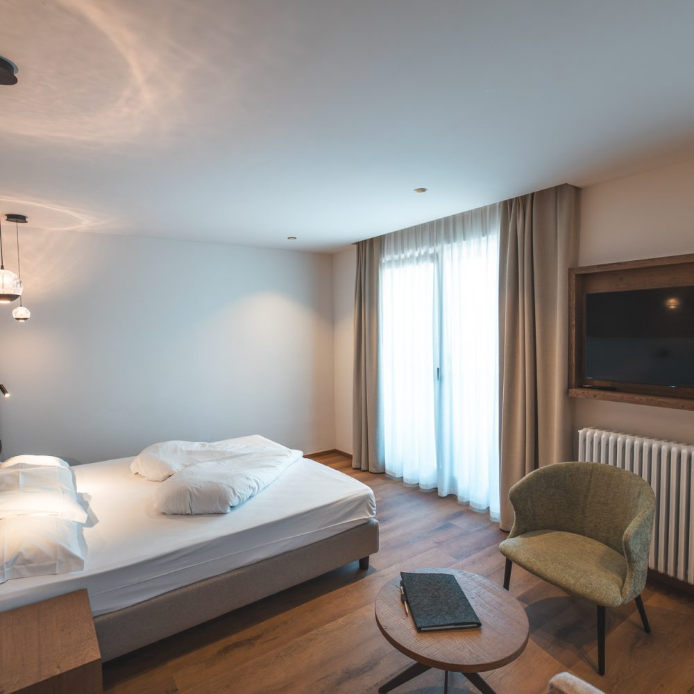 caminetto-mountain-resort-camere-new-junior-suite-letto-matrimoniale