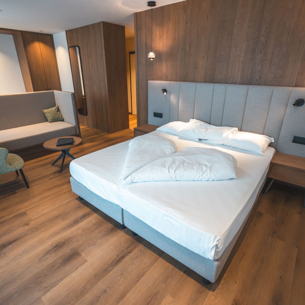 caminetto-mountain-resort-camere-new-junior-suite-letto-matrimoniale-2